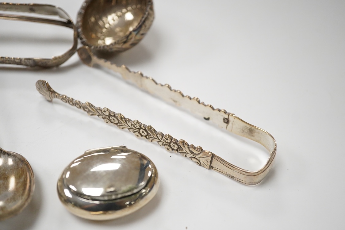 Sundry small silver including two pill boxes, a concave card case, Saunders & Shepherd, Chester, 1897, 79mm, unmarked toddy ladle with baleen handle, 925 flower ornament, small cream jug, two pairs of Georgian sugar tong